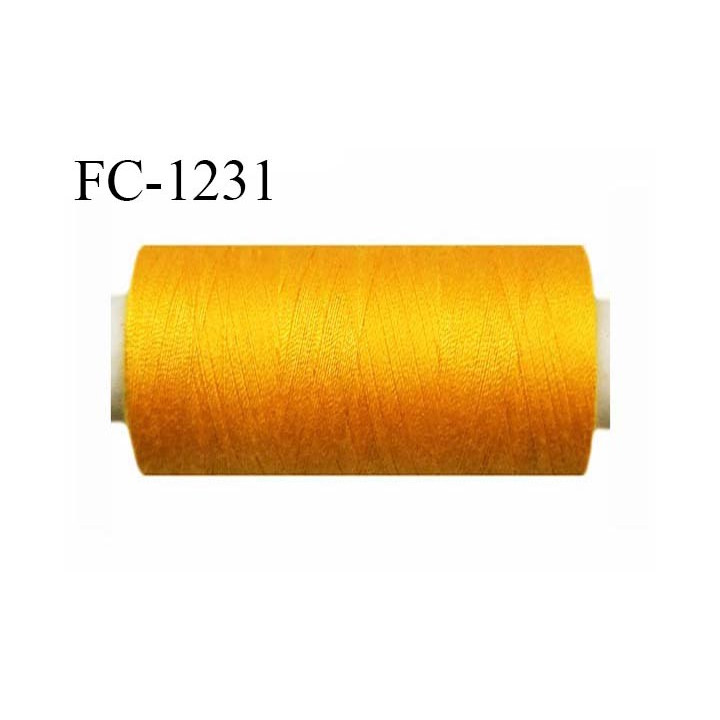 Bobine 1000 m fil polyester n°80 couleur orange clair lumineux longueur de bobine 1000 mètres bobiné en France certifié oeko tex