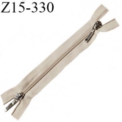 Fermeture zip 15 cm double curseur couleur beige non séparable longueur 15 cm largeur 2.5 cm largeur du zip nylon 5 mm