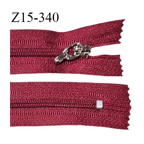 Fermeture zip 15 cm couleur rouge bordeaux non séparable curseur métal longueur 15 cm largeur 2.7 cm largeur du zip 4 mm