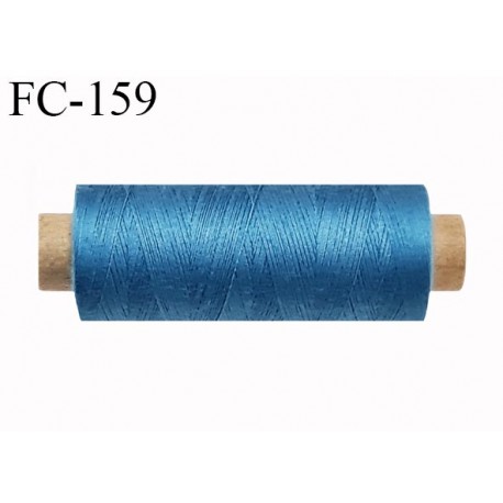 bobine de fil polyester n° 100 couleur bleu longueur de la bobine 500 mètres fabriqué en France