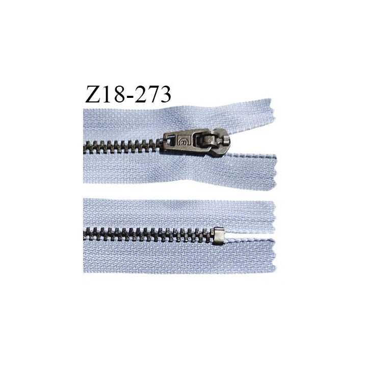 Fermeture zip 18 cm non séparable couleur bleu gris longueur 18 cm largeur 2.7 cm glissière métal couleur laiton largeur 4.5 mm