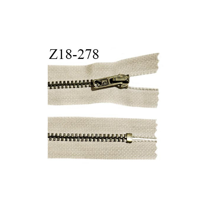 Fermeture zip 18 cm non séparable couleur blanc longueur 18 cm largeur 2.5 cm glissière métal couleur laiton largeur 4.5 mm