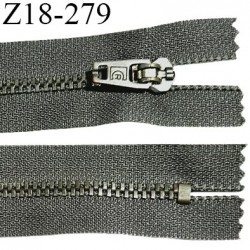 Fermeture zip 18 cm non séparable couleur kaki foncé longueur 18 cm largeur 2.5 cm glissière métal couleur laiton largeur 4.5 mm