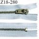 Fermeture zip 18 cm non séparable couleur bleu clair longueur 18 cm largeur 2.5 cm glissière métal couleur laiton largeur 4.5 mm