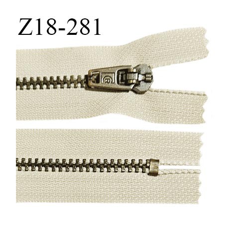 Fermeture zip 18 cm non séparable couleur beige longueur 18 cm largeur 2.5 cm glissière métal couleur laiton largeur 4.5 mm