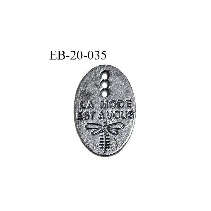 Plaque en métal couleur chrome avec 3 trous inscription La mode est à vous largeur 13 mm hauteur 20 mm prix à la pièce