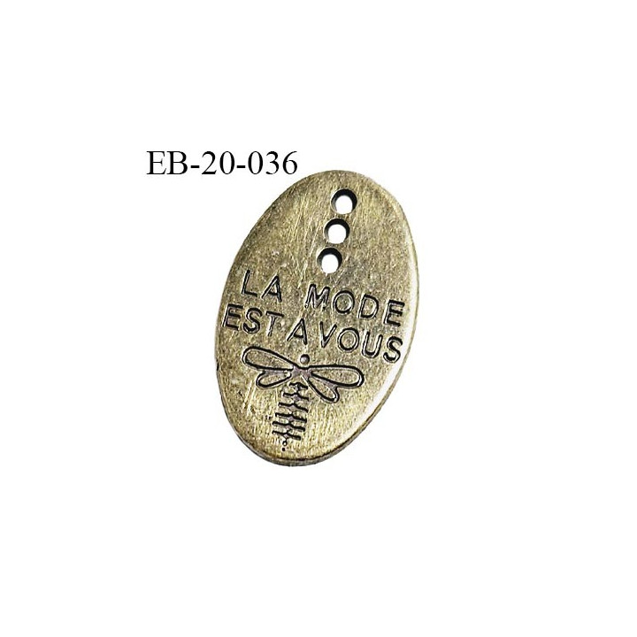 Plaque en métal couleur laiton doré avec 3 trous inscription La mode est à vous largeur 13 mm hauteur 20 mm prix à la pièce