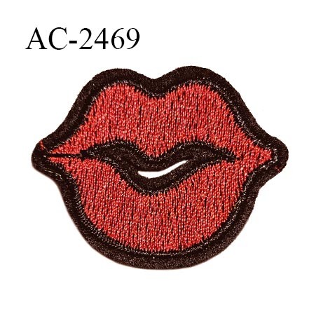 Décor ornement écusson bouche en feutrine rouge et noir largeur 4.5 cm hauteur 3.5 cm à coudre prix à l'unité