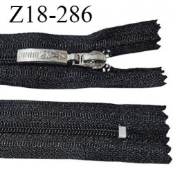 Fermeture zip 18 cm couleur noir non séparable curseur métal avec inscription AIRNESS longueur 18 cm largeur 2.7 cm