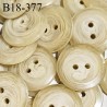 Bouton 18 mm pvc 2 trous couleur beige marbré en transparence épaisseur 3 mm diamètre 18 mm prix à l'unité