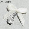 Noeud lingerie 20 mm haut de gamme en satin couleur écru avec pendentif argent et un strass effet diamant largeur 20 mm