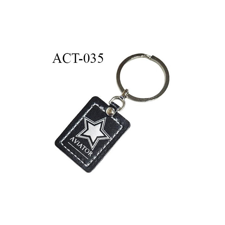 Porte clé effet cuir noir avec motif étoile argent inscription AVIATOR  longueur 3.6 cm largeur 2.7 cm épaisseur 2 mm
