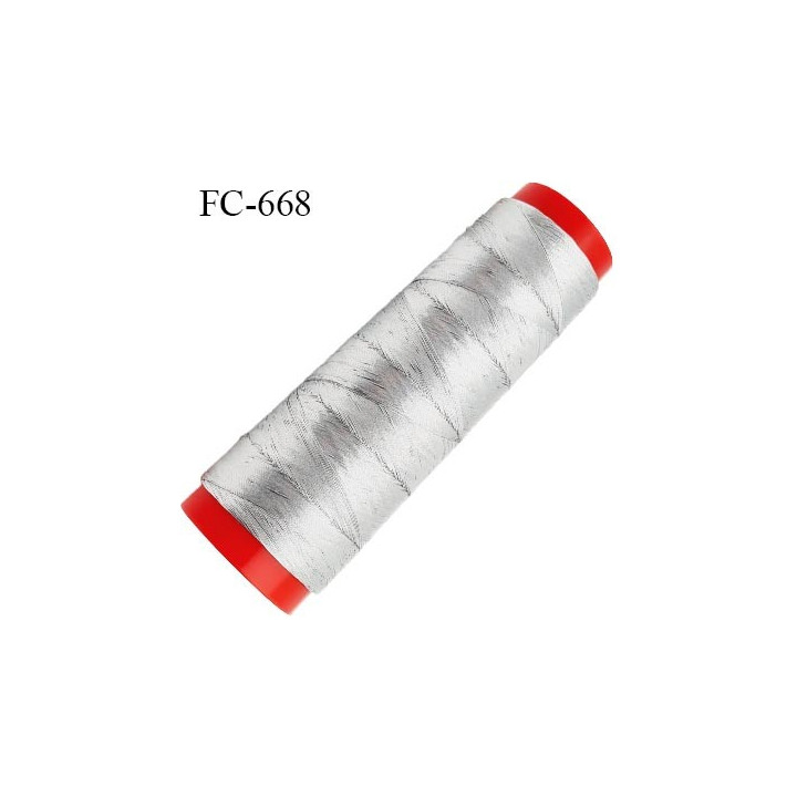 Cone 1000 m de fil couleur  argent doré brillant  composition 58 % polyester continu et polyester métalisé 42 % bobiné en france
