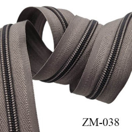 fermeture éclair de marque YKK au mètre couleur rouge un curseur au mètre largeur 27 mm largeur du zip 5 mm