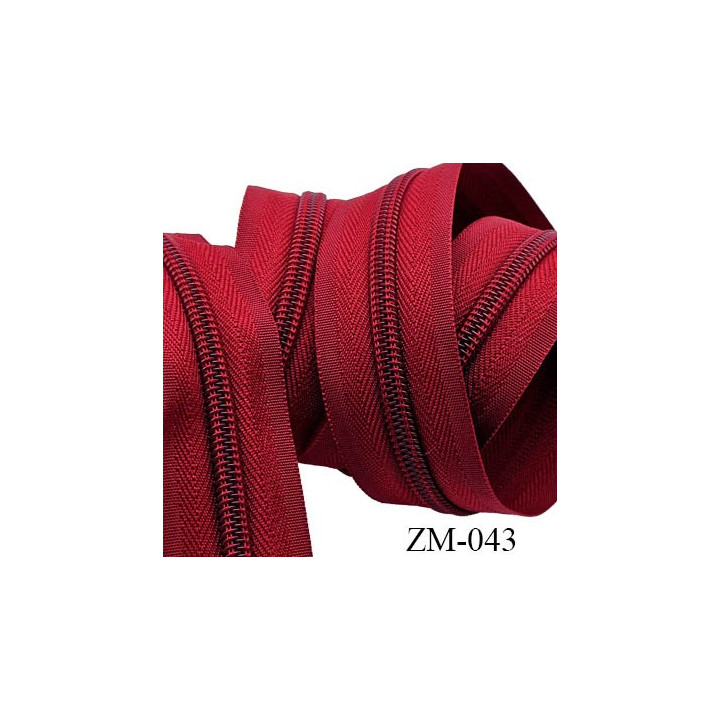 fermeture éclair de marque YKK au mètre couleur rouge un curseur au mètre largeur 27 mm largeur du zip 5 mm