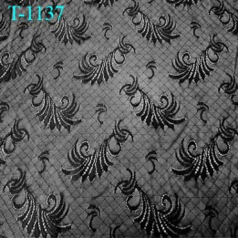 Dentelle brodé  sur tulle  couleur anthracite ardoise très haut de gamme largeur 135 cm  prix pour 10 centimètres