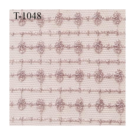Dentelle tissu lingerie brodé sur tulle couleur brume rosé clair très haut de gamme largeur 130 cm prix pour 10 cm de longueur