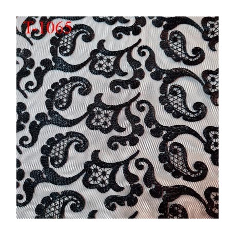 Dentelle brodé sur tulle non extensible couleur noir très haut de gamme largeur 145 cm prix pour 10 centimètres