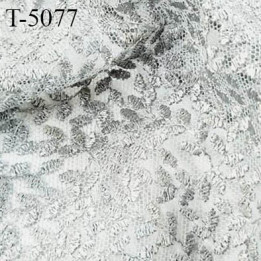 Dentelle brodé sur tule souple couleur gris argent  haut de gamme trop belle largeur 130 cm  prix pour 10 centimètres