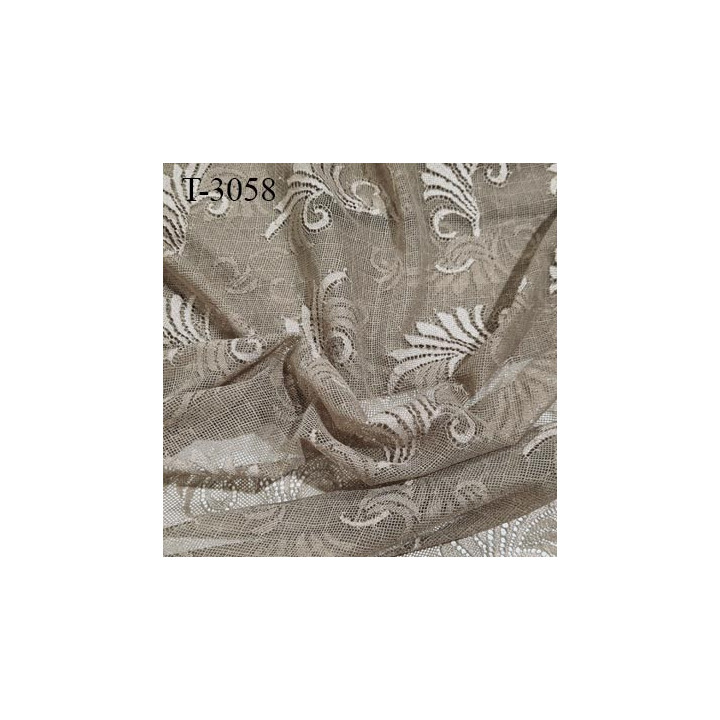 Dentelle brodé  sur tulle  couleur café très haut de gamme largeur 140 cm  prix pour 10 centimètres