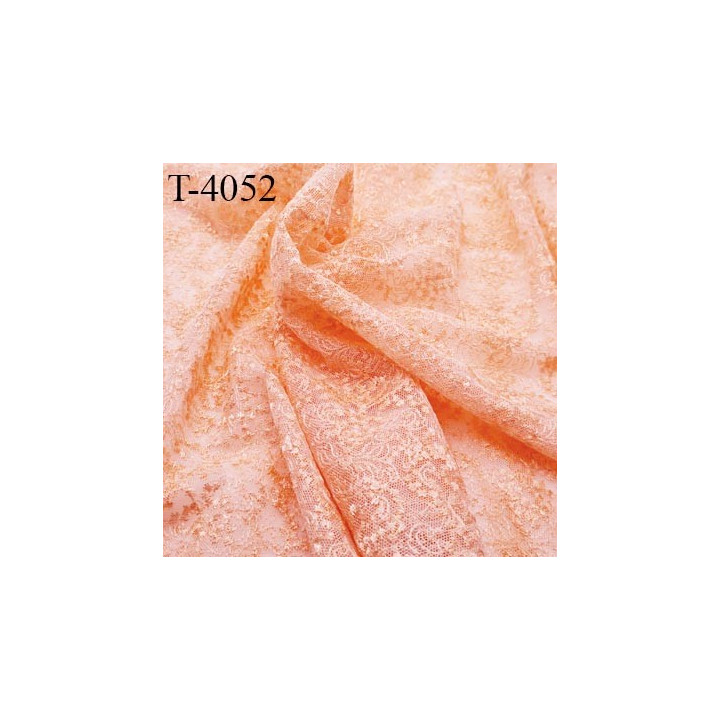 Dentelle brodé sur tulle non extensible couleur saumon haut gamme largeur 135 cm