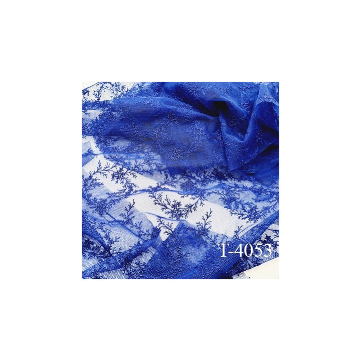 Dentelle brodé  sur tulle non extensible  couleur bleu lumineux  très haut de gamme largeur 135 cm  prix pour 1 mètre