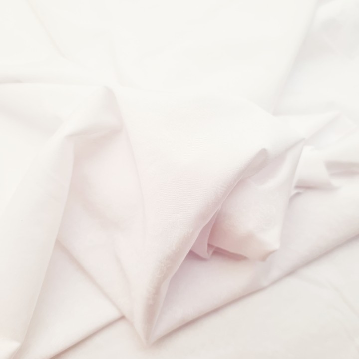 Tissu lycra élasthanne blanc à motifs haut de gamme 105 gr au m2  155 cm de large prix pour 1 mètre