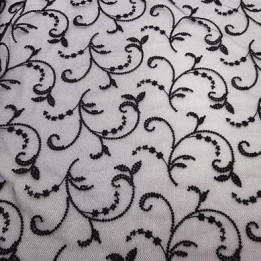 Broderie sur tulle non extensible couleur noir haut de gamme largeur  155 cm de large  prix au mètre