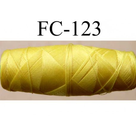 cocon bobine de fil nylon épaisseur 120/2 couleur jaune longueur 200 mètres largeur du cocon 4 cm diamètre 1.5 cm