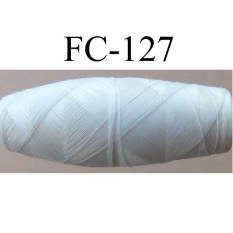 cocon bobine de fil polyester épaisseur 120/2 couleur blanc cassé longueur 200 mètres largeur du cocon 4 cm diamètre 1.5 cm