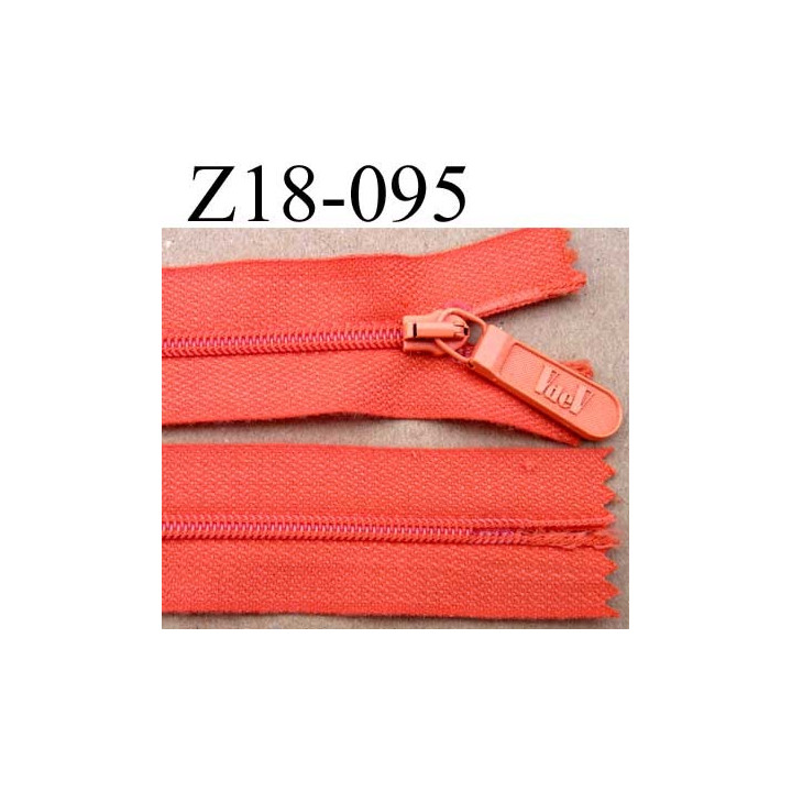 fermeture  éclair  longueur 18 cm couleur orange non séparable largeur 2.5 cm glissière en nylon largeur 4 mm curseur métal