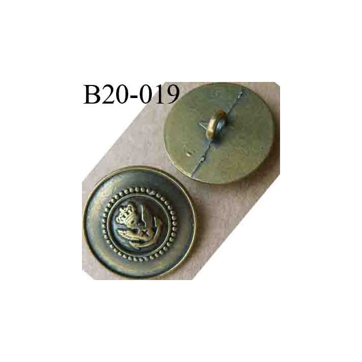 bouton 20 mm métal style ancien bronze patiné insignes royauté au centre accroche un anneau diamètre 20 mm