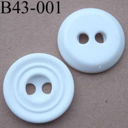 bouton  diamètre 43 mm  pvc couleur blanc rainuré 2 trous de 7 mm 