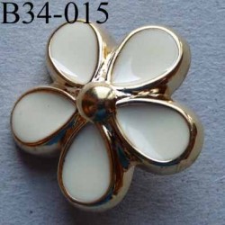 bouton fleur PVC diamètre 34 mm couleur ivoire et doré accroche un anneau diamètre 34 mm