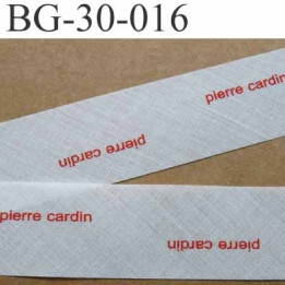 biais à plier PIERRE CARDIN couleur  blanc cassé et texte en rouge largeur 30 mm prix au mètre