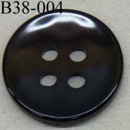 bouton 38 mm  couleur noir 4 gros trous (diamètre 6 millimètres) épaisseur 5 mm