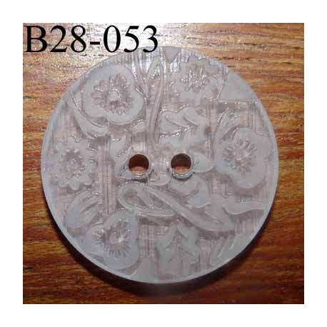 bouton fantaisie 28 mm couleur blanc translucide avec motifs floraux en relief ton sur ton 2 trous diamètre 28 millimètres