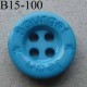bouton diamètre 15 mm 4 trous couleur turquoise inscription JEAN BOURGET diamètre 15 mm