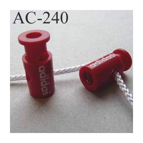 arrêt cordon stop cordon rond ADIDAS couleur rouge de taille 26 mm x 11 mm vendu à l'unité