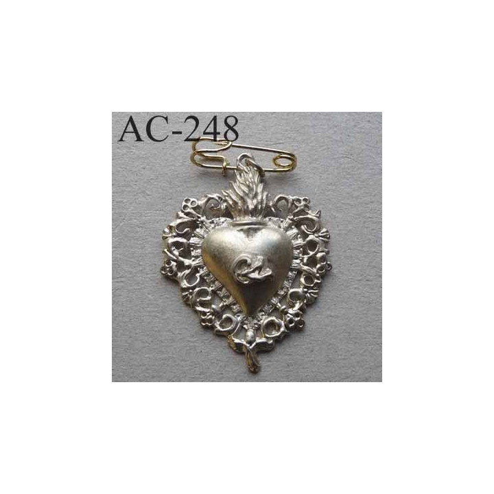 broche COEUR en métal veilli argenté siglé CL CHRISTIAN LACROIX collector montée sur épingle hauteur 41 mm largeur 32 mm