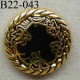 bouton 22 mm pvc imitation métal couleur doré et noir accroche un anneau