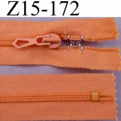 fermeture zip à glissière avec stop agrafe longueur 15 cm couleur saumon orangé non séparable largeur 2.2 cm glissière nylon
