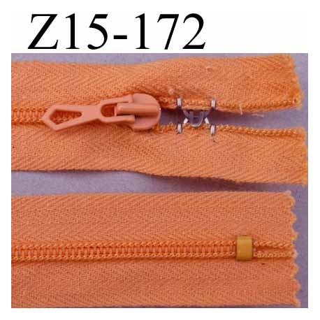 fermeture zip à glissière avec stop agrafe longueur 15 cm couleur saumon orangé non séparable largeur 2.2 cm glissière nylon