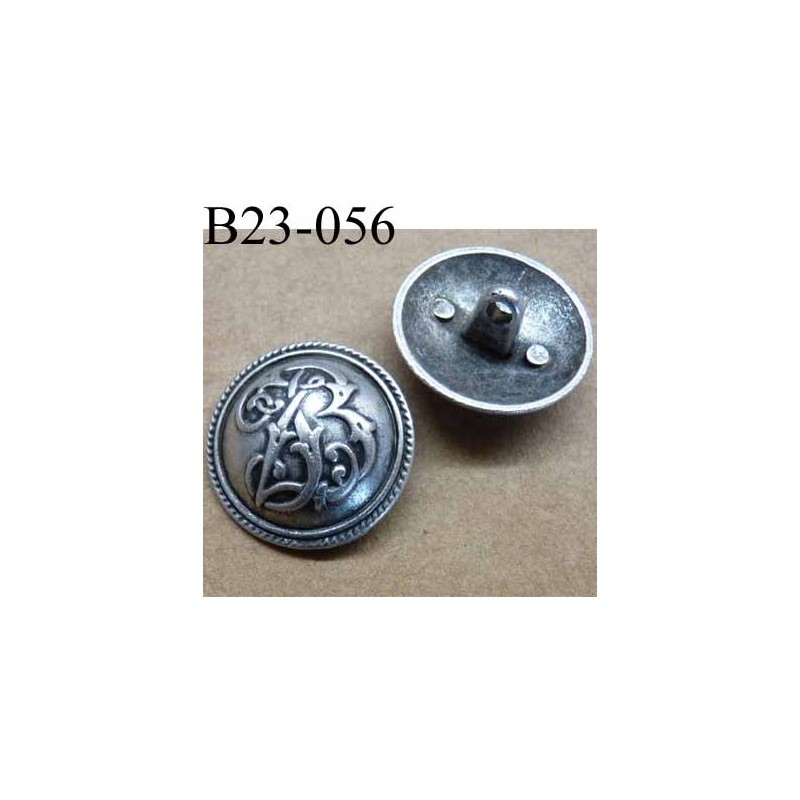 bouton 23 mm en métal style etain accroche avec un anneau diamètre 23  millimètres