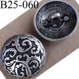 bouton  en métal  25 mm couleur étain ancien et noir acroche avec un anneau au dos diamètre 25 millimètres décor incrusté