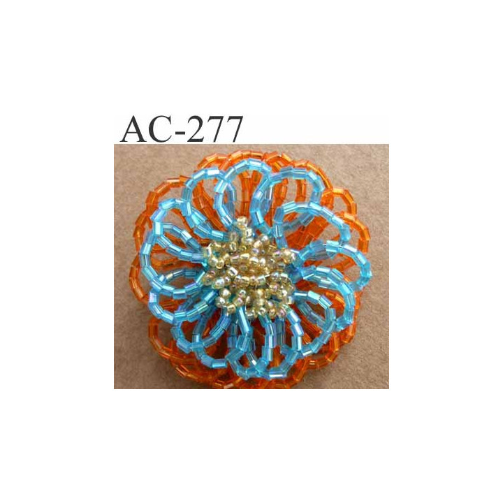 broche  montée en perles sur épingle couleur orange bleu et doré brillante épaisseur 19 mm diamètre 5 cm superbe