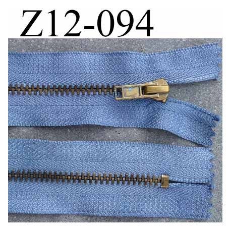 ( 2éme choix déclassé) fermeture zip longueur 12 cm couleur bleu non séparable largeur 3 cm largeur du zip métal 5 mm