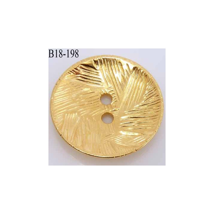 bouton 18 mm couleur doré en métal très joli la couleur est celle d'une pièce d'or diamètre 18 mm 