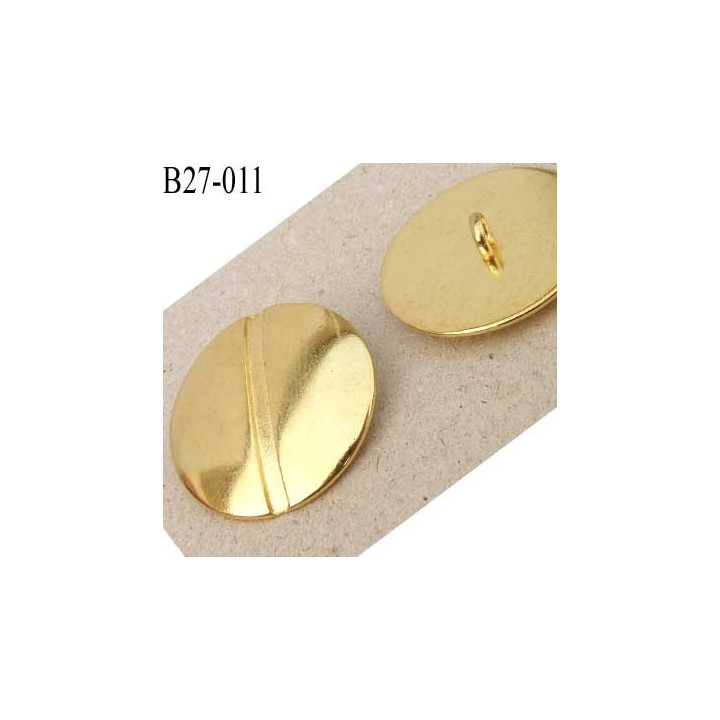 Bouton 27 mm couleur doré en métal très joli la couleur est celle d'une pièce d'or diamètre 27 mm 